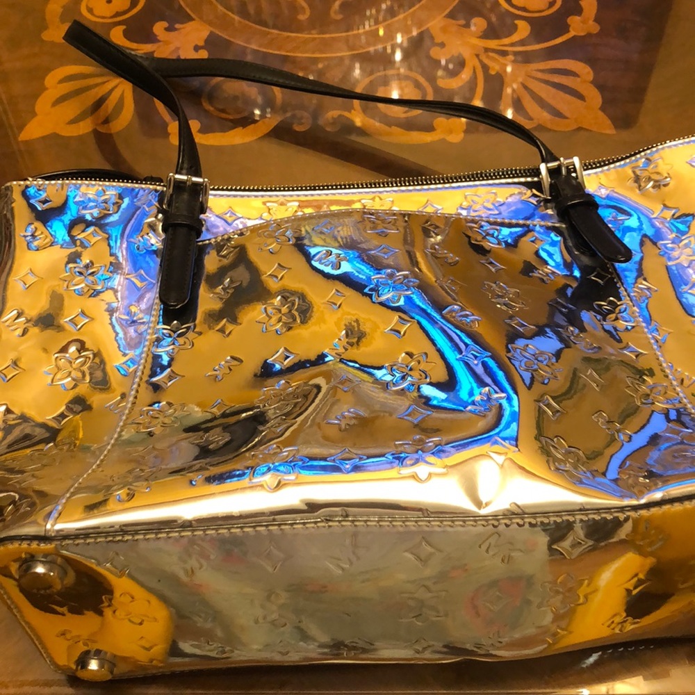 Like new Michael Kors shiny silver tote